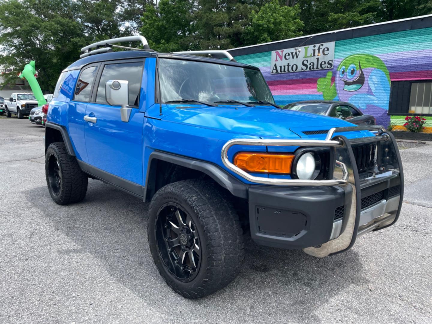 2007 BLUE TOYOTA FJ CRUISER BASE (JTEZU11F970) with an 4.0L engine, Automatic transmission, located at 5103 Dorchester Rd., Charleston, SC, 29418-5607, (843) 767-1122, 36.245171, -115.228050 - Local Trade-in with CD/AUX/Sat/Bluetooth, Power Windows, Power Locks, Power Mirrors, All-weather Flooring, Rear Power Inverter, Keyless Entry, Tow Package. Clean Inside & Out!! 222k miles Located at New Life Auto Sales! 2023 WINNER for Post & Courier's Charleston's Choice Pre-owned Car Dealer AND 2 - Photo#0